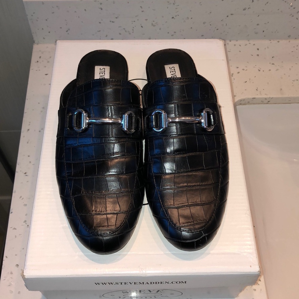 Black leather loafers